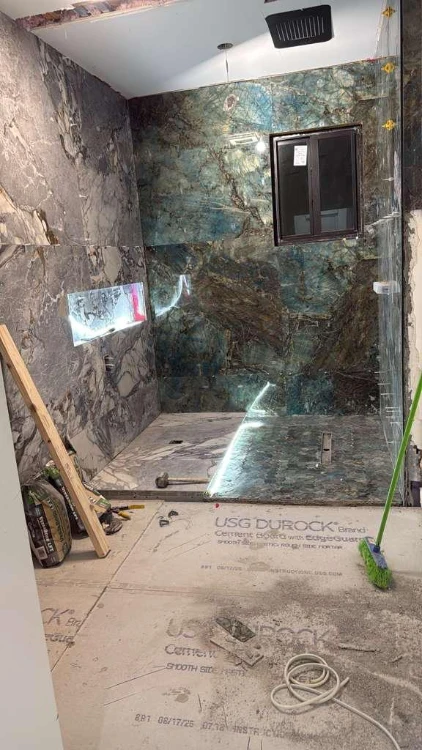 Shower wall and floor tile during bathroom renovation