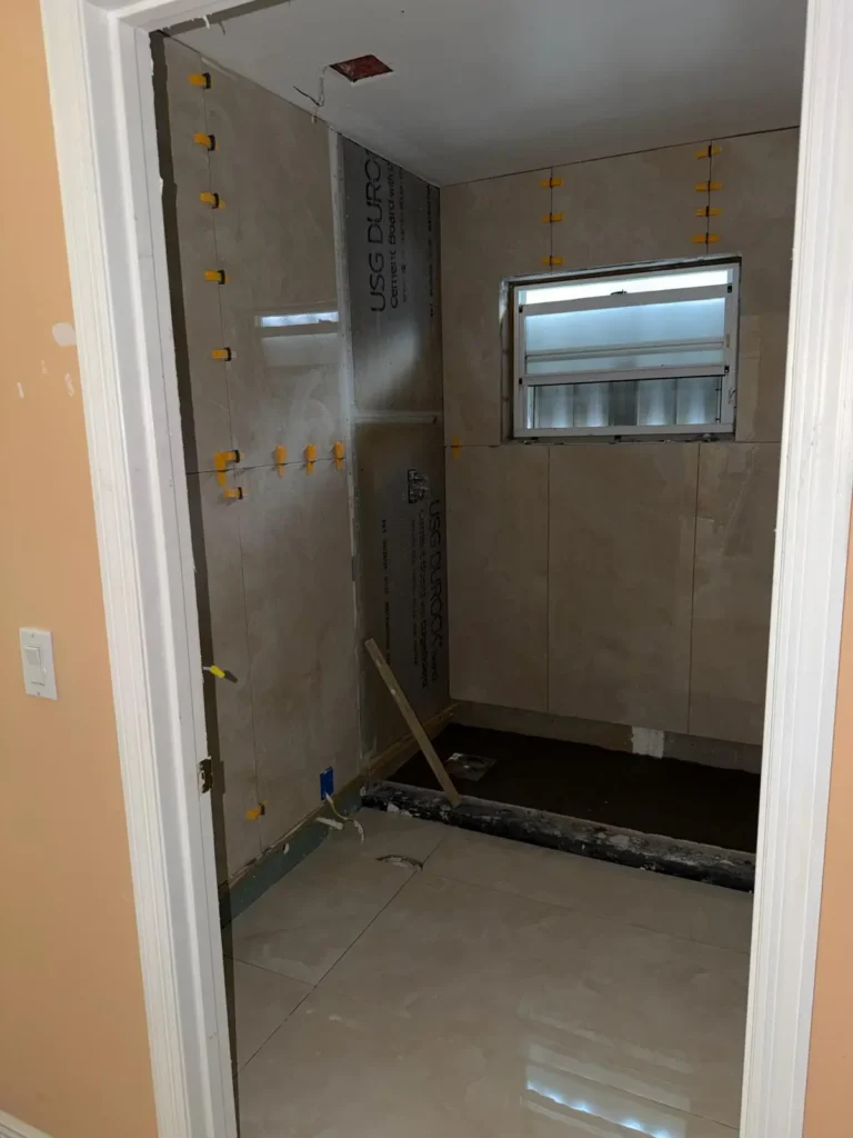 Shower opening with prepared walls and a small window